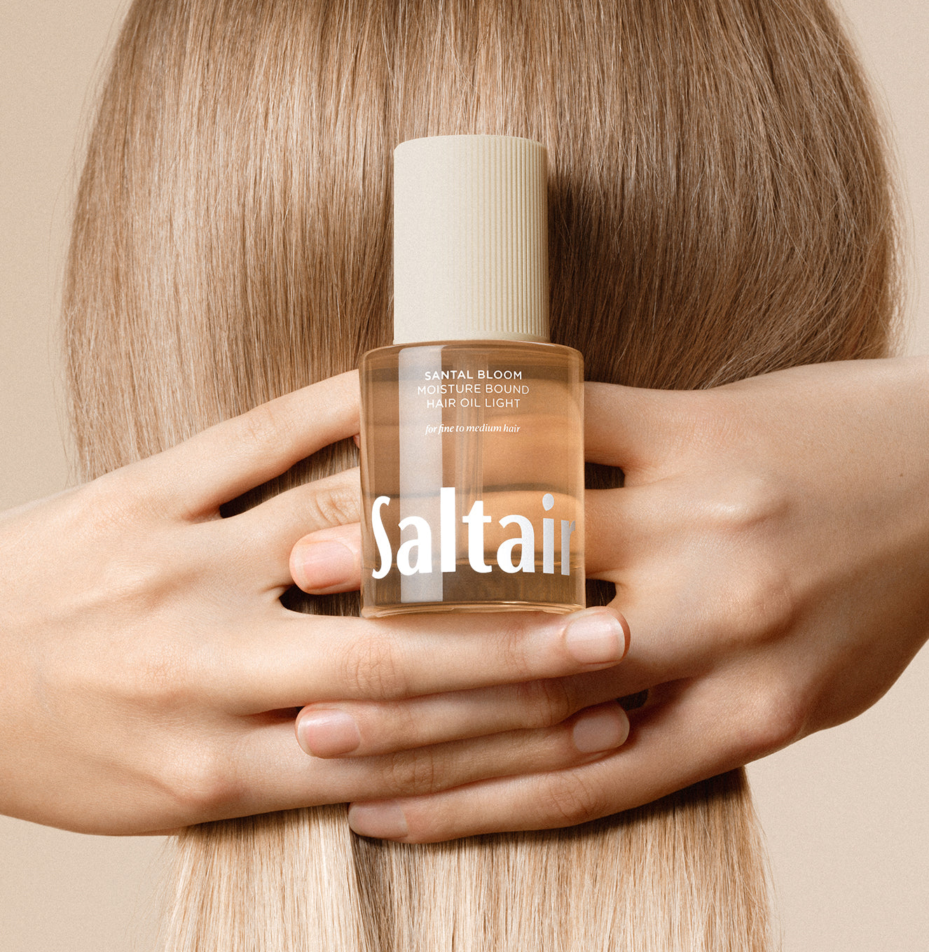 4-SLTR_PDP_Haircare-HairOil-Light_LifestyleA_5f8370fe-33e5-4f96-96f3-cecd63af86b5_3000x.jpg